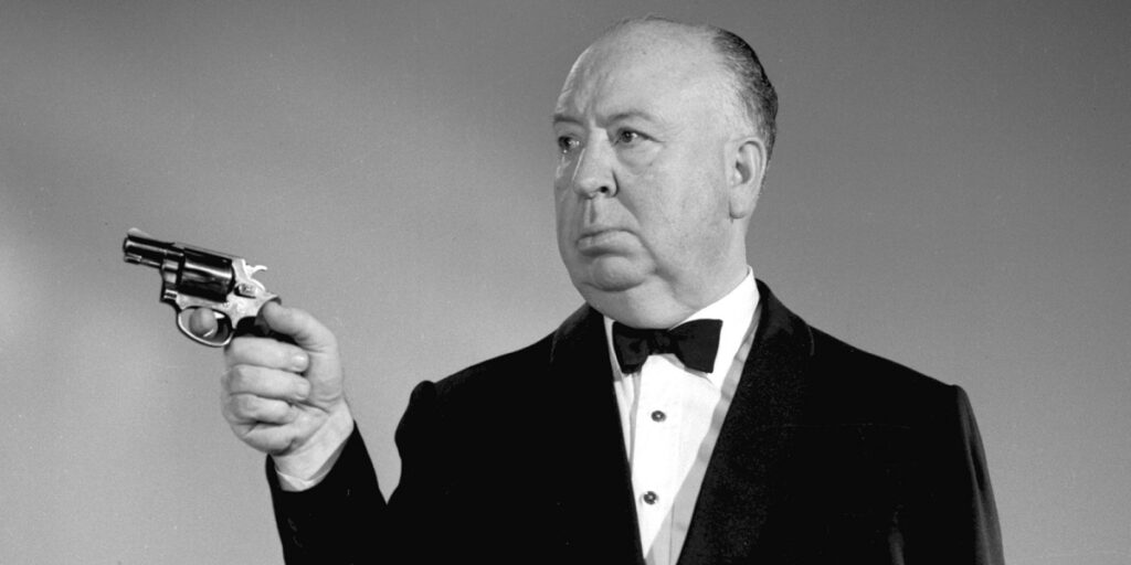Alfred Hitchcock with a gun